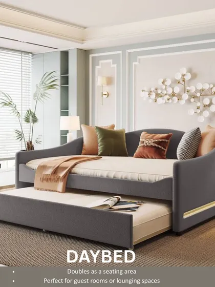 A daybed with a trundle is a versatile piece of furniture. It doubles as a seating area and is perfect for guest rooms or lounging spaces where you need an extra bed.