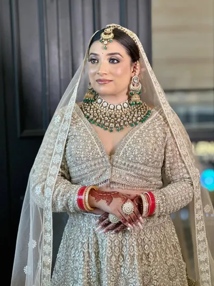 Another angle of the bridal makeup demo, highlighting the flawless base and intricate details of the look.