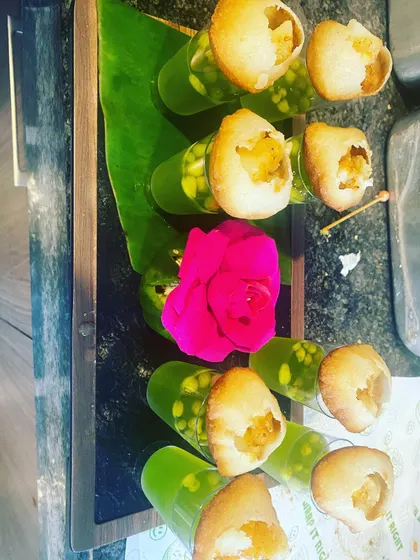 A modern take on a classic street food favorite. These gol gappe shots are served in individual glasses, making them a fun and mess-free appetizer for guests to enjoy while mingling.