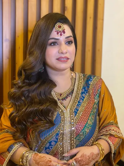 Another photo of my beautiful client with classic Hollywood waves, looking timelessly elegant for her event.
