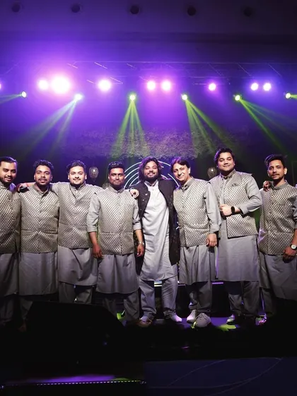 Meet the full Sufi Folks ensemble. We are a team of dedicated musicians who always arrive dressed to match the elegance of your event. This photo captures our unity and professionalism on stage, ready to create a magical evening.