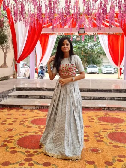 The full outfit in a beautiful wedding setting.