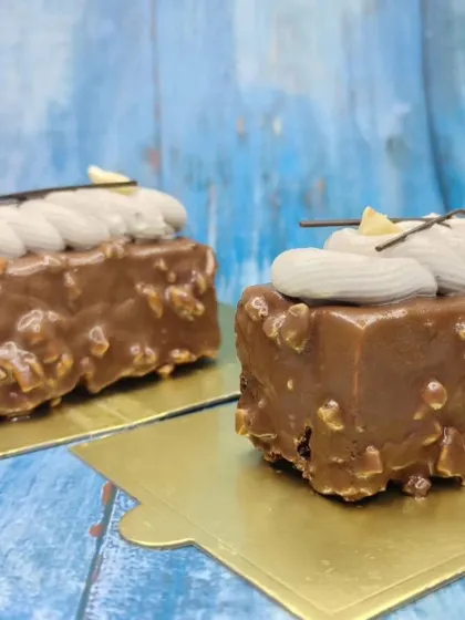 Another angle of our hazelnut mousse pastries, highlighting their professional and consistent quality.