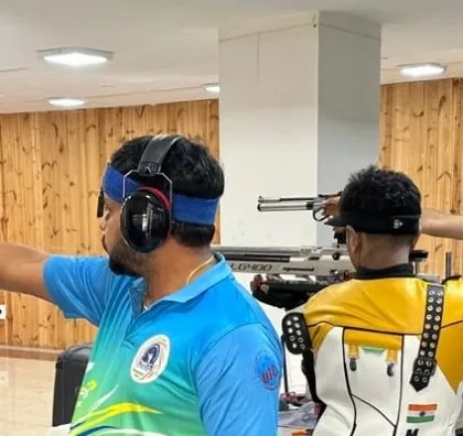 Adult shooters taking aim during a guest session. These introductory experiences are not just for kids; they are a popular choice for adults and corporate groups looking for a unique team-building activity.
