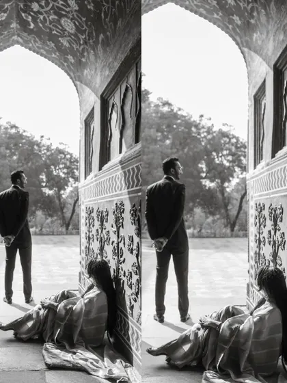 A timeless black and white composition, where the bride waits in a historic archway. This artistic shot plays with light, shadow, and emotion, creating a powerful narrative.