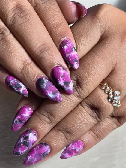 Another view of the purple marble nail art, showing how the pattern varies slightly from nail to nail, just like real marble.