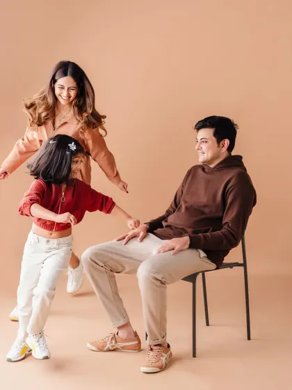 A candid moment of play during our family photoshoot. The unposed, joyful moments are always my favorite.