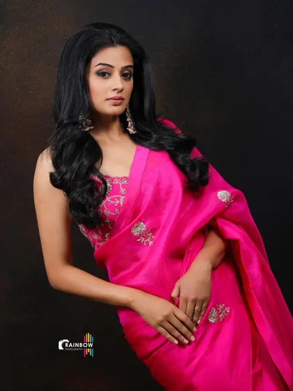 A full-length shot of Priyamani, emphasizing her poise and the elegance of the entire ensemble.