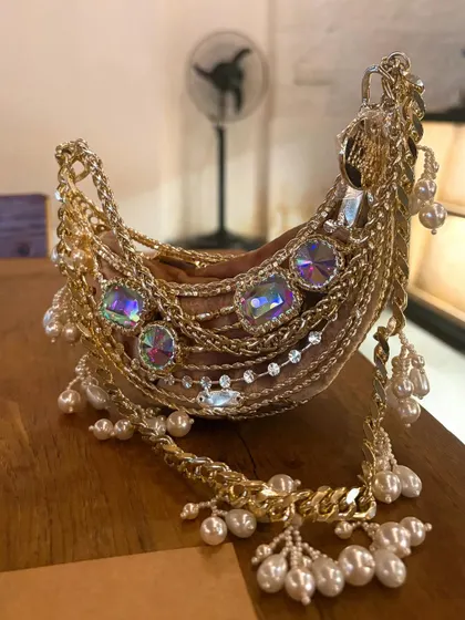 This Papa Don't Preach minaudière is a work of art. I love featuring maximalist, statement accessories from Indian designers that are bold and unconventional.