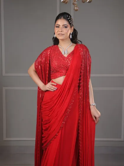 Create your beauty with a little help from makeup. This stunning look in a red saree is a perfect example of how the right details can make you shine.