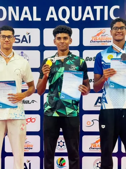 A podium shot of the 50m Freestyle winners, including Akash Mani.
