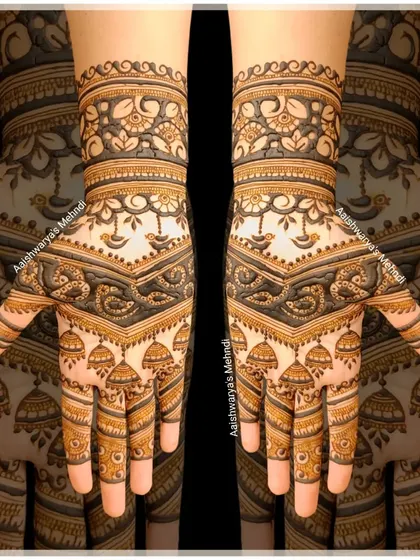 A beautiful design featuring jhumka and diya motifs. This is a perfect design for festivals like Diwali or for a wedding celebration.