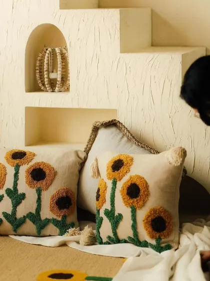 Our sunflower tufted cushion covers in a cozy, real-life setting. They are perfect for creating a comfortable and inviting nook in your home.