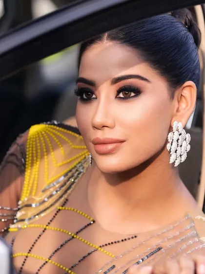 A glamorous cocktail look with a bold, black smokey eye. This is a classic, high-impact look that you will master in my course, perfect for any evening event.