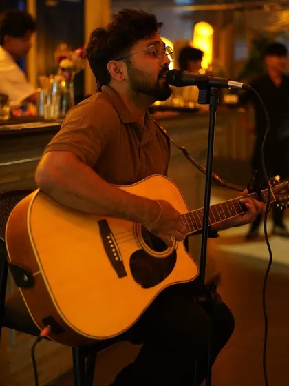 A candid shot from a recent gig at a cafe in Koramangala. This solo setup is perfect for creating a chill, intimate vibe in smaller venues.