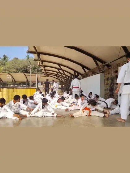 These images capture various moments from our training sessions and grading exams at different dojos, including Marathahalli and Malleshwaram, and at community events. Each picture shows the hard work and dedication that is central to our teaching philosophy.