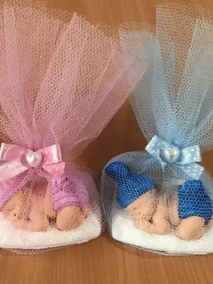 These sleeping baby candles are another adorable option for baby shower favors, available in both pink and blue.