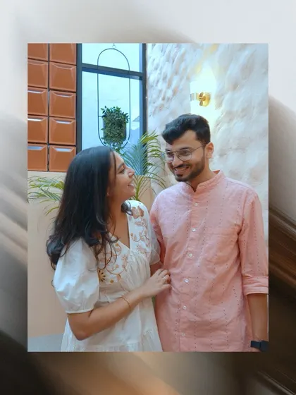 A candid, joyful moment of the couple sharing a laugh, captured in a dynamic, slightly blurred style that adds to the energy of the shot.