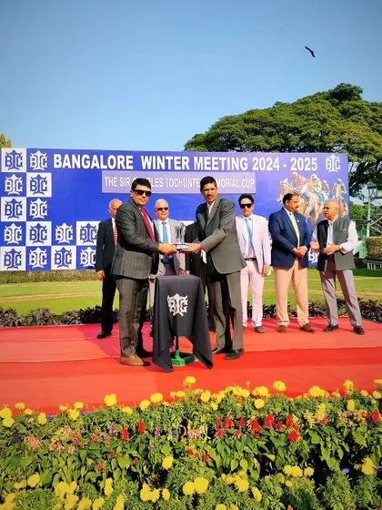 Dr. C.A. Prashanth presents The Sir Charles Todhunter Memorial Cup to the owner of Invincible.