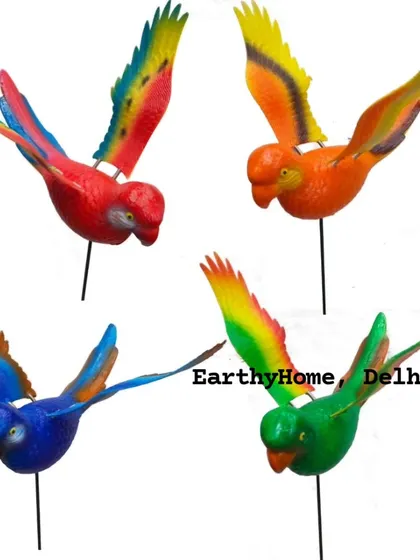 These vibrant, colorful parrot garden sticks are perfect for decorating your garden or balcony planters. They move with the wind, adding a dynamic element.