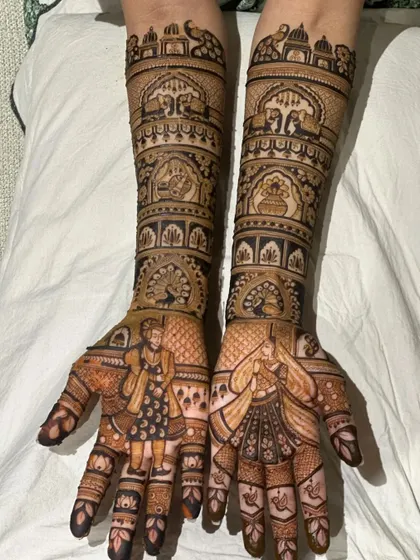 A classic bridal design with peacocks, elephants, and a couple portrait, all set against a clean, white background.