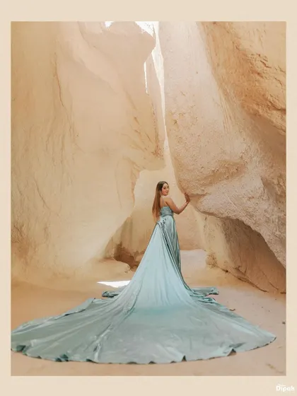 A stunning portrait of the bride in a flowing gown, captured inside a beautiful canyon in Turkey. I scout these unique locations to create truly unforgettable images.