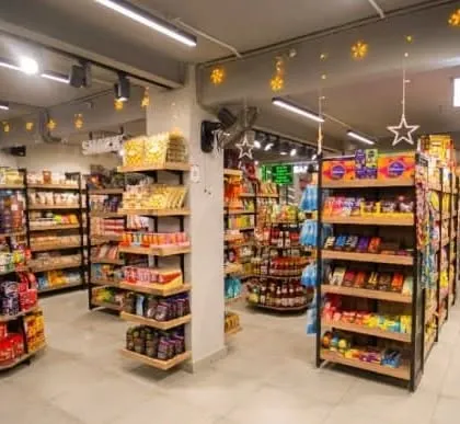 A wider view of the store's interior, showing the layout of the aisles and gondola shelving we installed to optimize the 565 sq. ft. space.