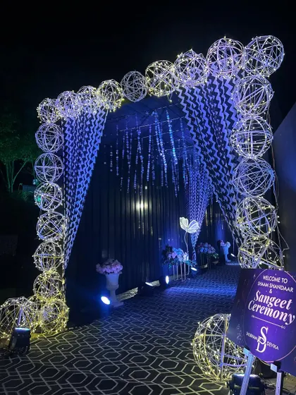 The welcome sign and entrance decor for the Sangeet, setting a glamorous tone for the night.