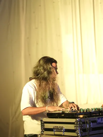A side profile of me focused on mixing during a wedding reception.