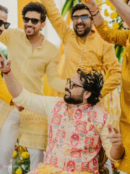 The groom and his groomsmen having a blast during the Haldi ceremony.