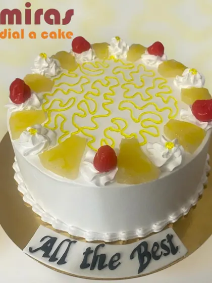 A light and refreshing pineapple cake, perfect for an afternoon celebration. It's topped with fresh pineapple chunks and cherries for a classic, fruity flavor that everyone enjoys.