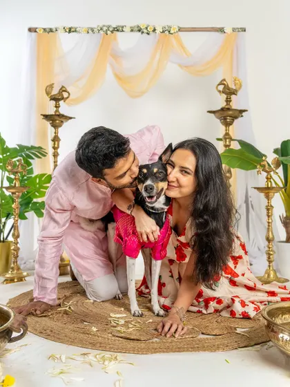 A couple sharing a sweet moment with their Indie dog during our Diwali mini-session. The love in this photo is what the festival of lights is all about.