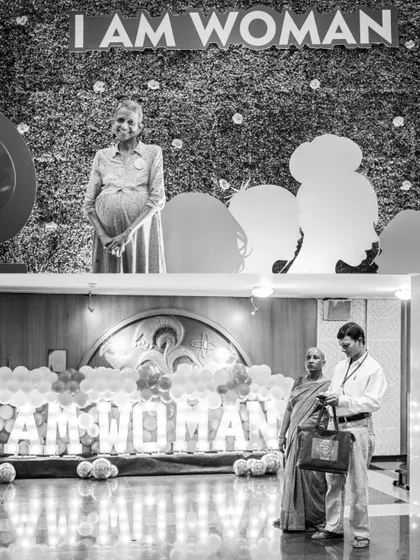 The powerful "I AM WOMAN" decor at the Tata Memorial Hospital event. This image captures the empowering theme of the day, celebrating the strength and resilience of every woman present.