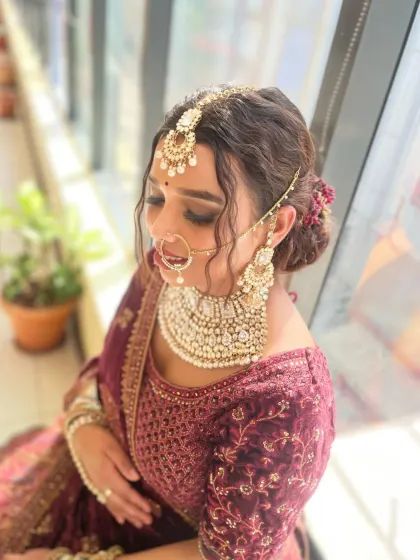 The complete royal bridal look, showing the perfect balance of bold makeup and elegant styling. My students learn to create looks that are both traditional and contemporary.