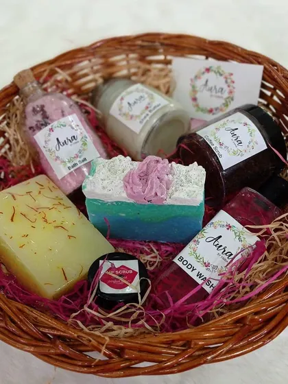 A lovely basket of my favorite bath and body treats. This assortment includes saffron soap, a cupcake soap, body wash, bath salts, coffee scrub, and more, all nestled in a rustic wicker basket.