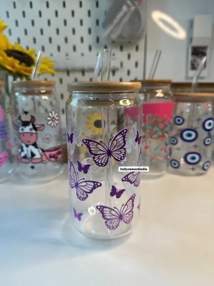 The purple butterfly glass sipper shown in my studio setup, ready to be shipped.