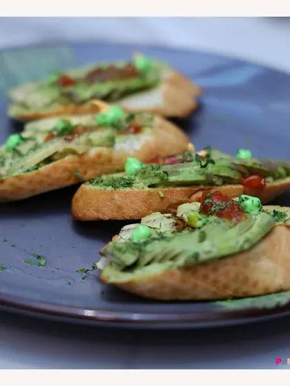 Our Avocado Salsa Bruschetta is a fresh and healthy option. We top crispy toasted bread with creamy sliced avocado and a zesty salsa, creating a light yet flavorful appetizer or snack.
