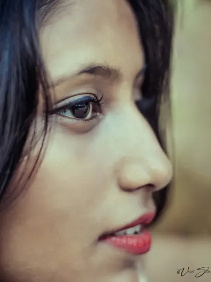 A detailed close-up profile shot. This type of image is great for showcasing facial features and is an essential part of a comprehensive modeling portfolio.