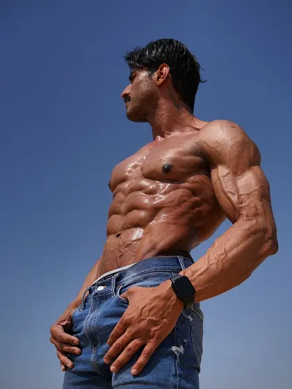 If your dreams don't scare you, they are not big enough. A powerful outdoor shot of my shredded physique, reaching for big goals.