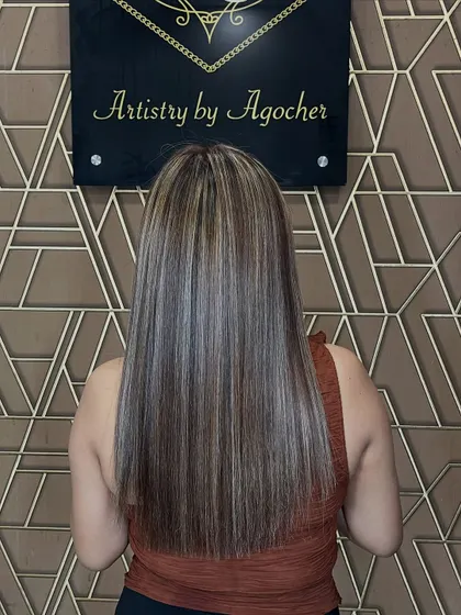 This look combines a global base color with delicate babylights for a rooted, dimensional style that glows in every strand.
