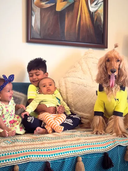 The full cousin crew. Posto posing patiently with all the little ones in the family. He's the most responsible big brother.