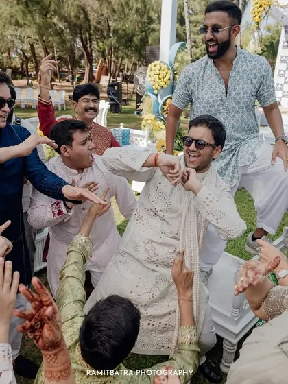 The groom dances with abandon during his Baraat at a fun-filled Goa wedding.