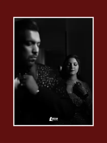 A moody and romantic black and white portrait of Ekta and Ashutosh, capturing a quiet, intimate moment.