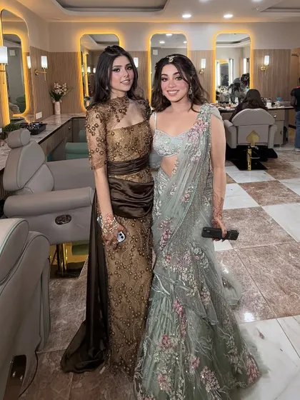 Glowing together, sisters forever. Another shot of this beautiful duo, showcasing their coordinated yet individual styles.