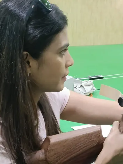 Another shot of champion Trupti Murgunde preparing to shoot. Her visit was a great reminder that the spirit of a champion shines through in any sport.