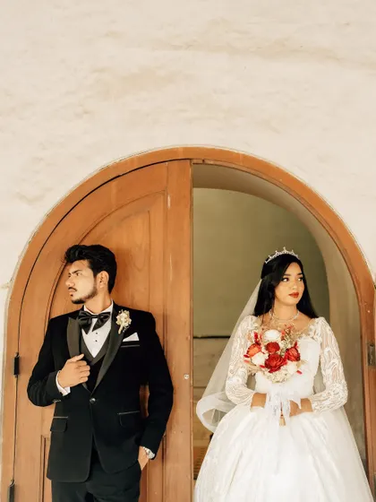A variation of the editorial pose against the wooden door, showing a different angle and mood. I like to provide a variety of shots from each setup.