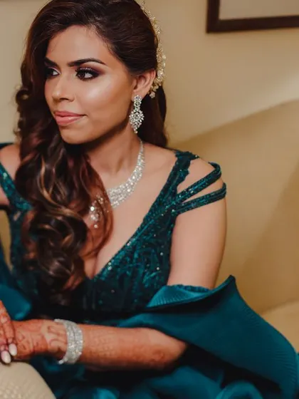 A duplicate of the beautiful bride's portrait, emphasizing the glamour and style of the reception look.