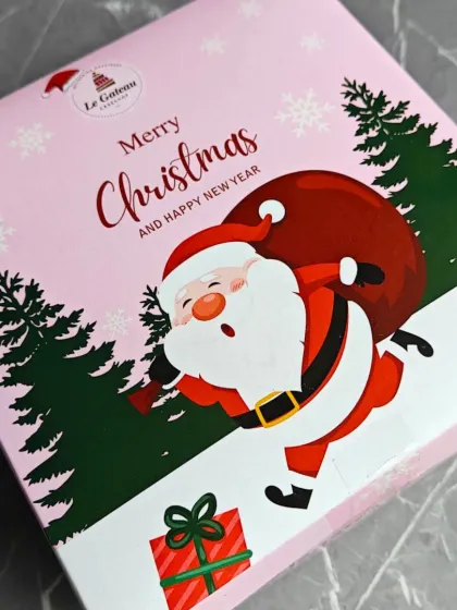 Our festive plum cakes come in this cheerful Christmas-themed box, making them ready to gift.