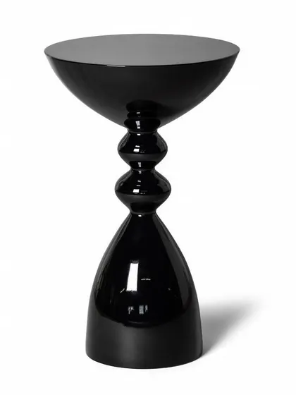 This inspiration piece is a sculptural side table with a glossy black powder-coated finish. Its unique, stacked-sphere design makes it a modern and artistic addition to any room.