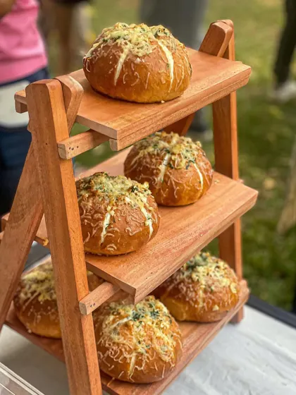 A display of my Korean Cream Cheese Buns at a pop-up event. They are always a crowd favorite.